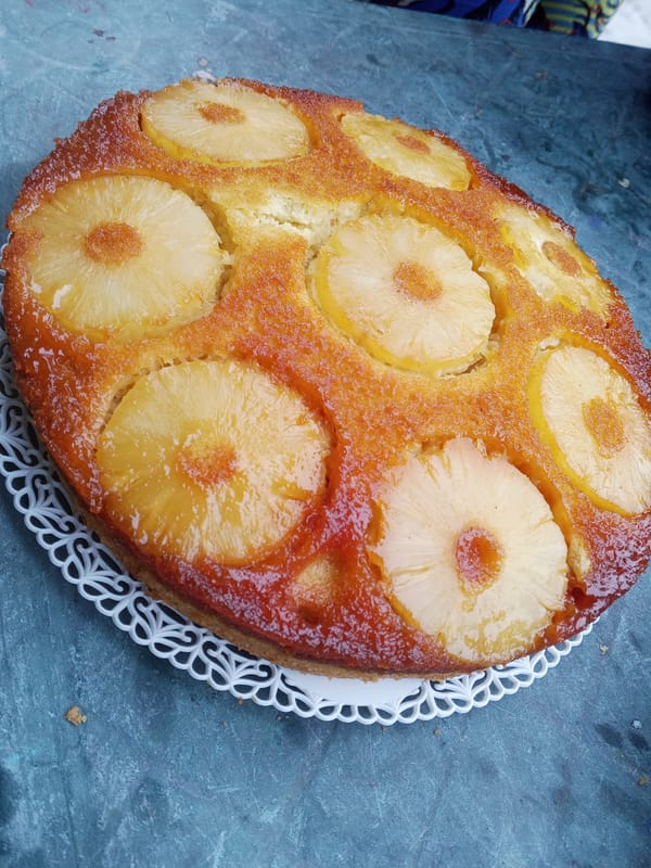 Child plays with scooter in Venezuelan neighborhood, cake documented