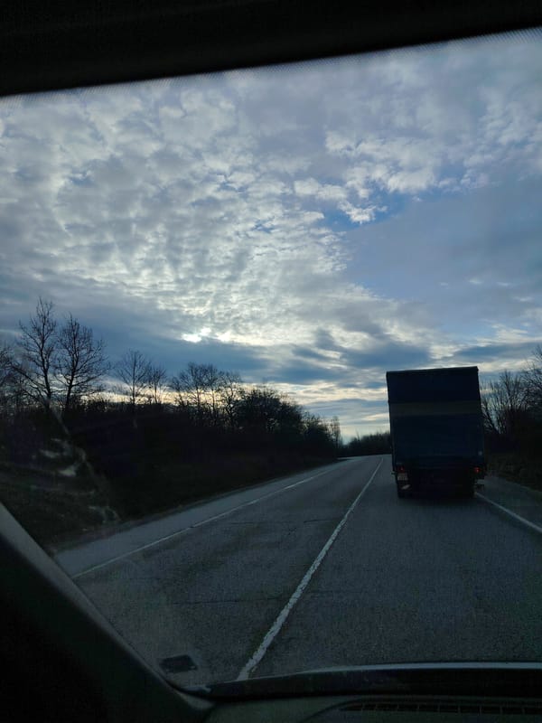 Driver follows truck on rural Bulgarian road