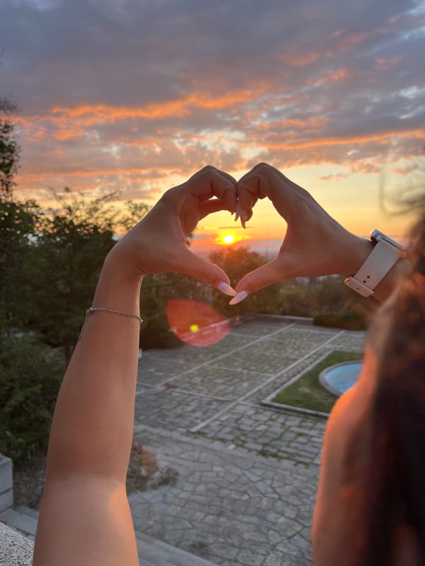 Heart hands at golden hour on Plovdiv's Nebet Tepe hill
