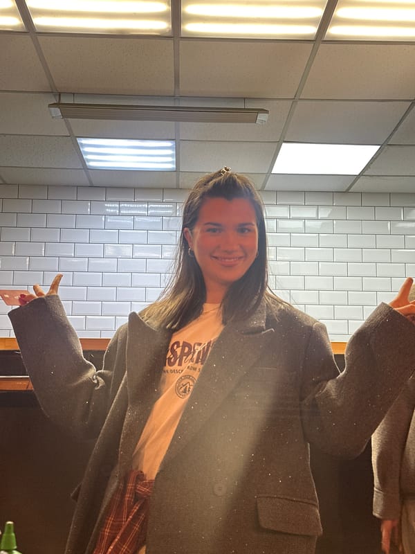 Woman photographed in indoor, outdoor locations during rainy afternoon