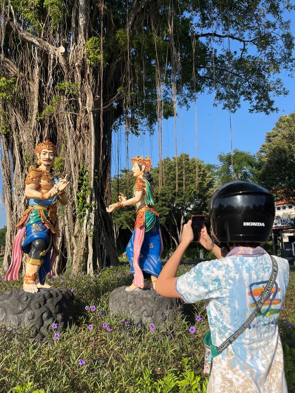 Exploring a Balinese garden full of traditional statues and sculptures