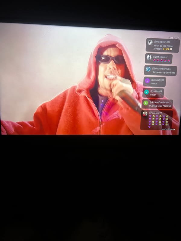 Bieber livestream performance captured on screen in Milan suburb