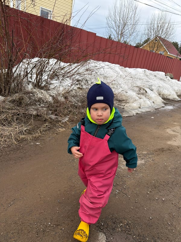 Mother and child enjoy spring playtime in Chaikovsky, Russia