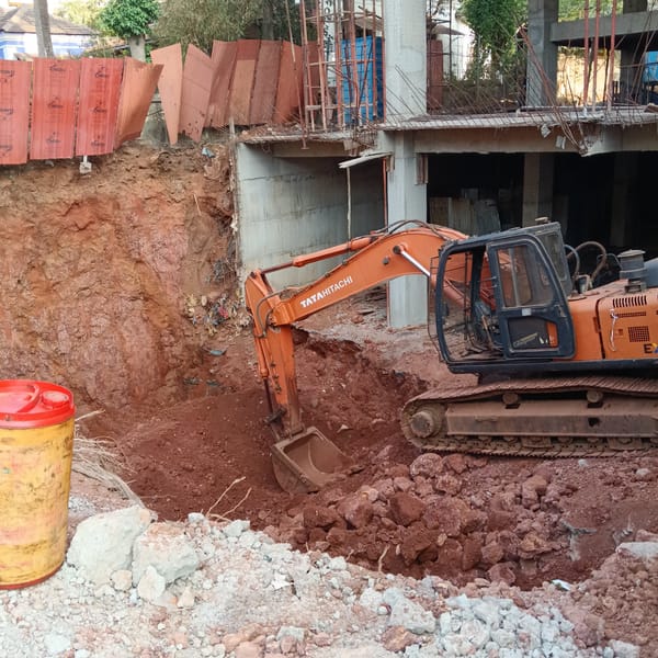 Construction and street food captured in Mapusa, India