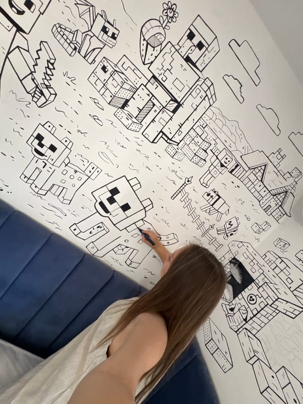 Woman creates Minecraft mural on wall in Budva, Montenegro