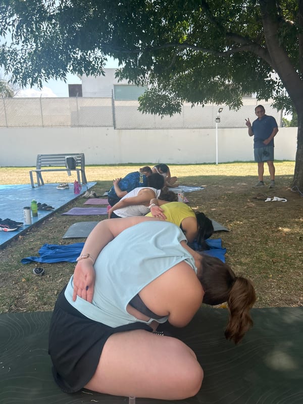 Outdoor yoga class held in Mexico neighborhood park