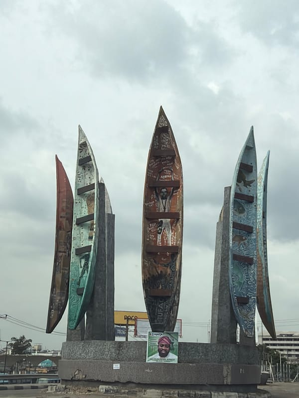 Painted dugout canoe sculpture spotted in Ikeja, Nigeria