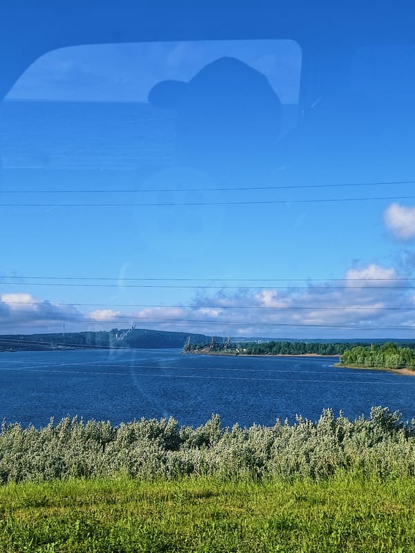 Calm morning view of Kama River documented near Chaikovsky