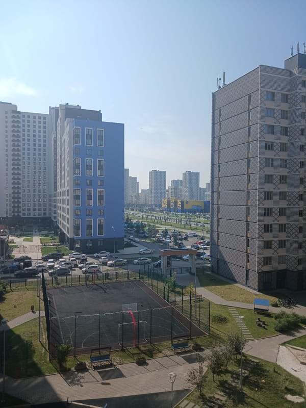Portraits and cityscape from a Yekaterinburg apartment window