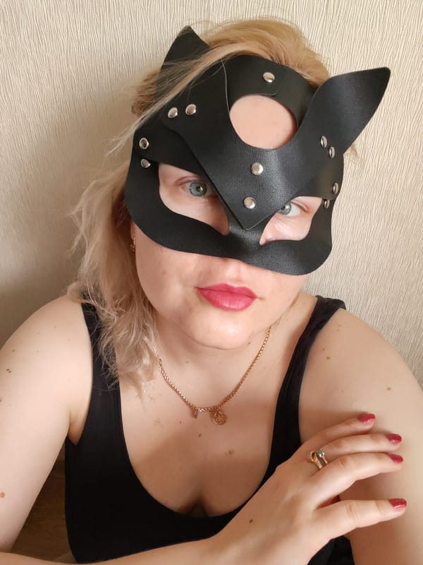 Morning domestic scenes captured in Izhevsk include masked woman, breakfast, dog