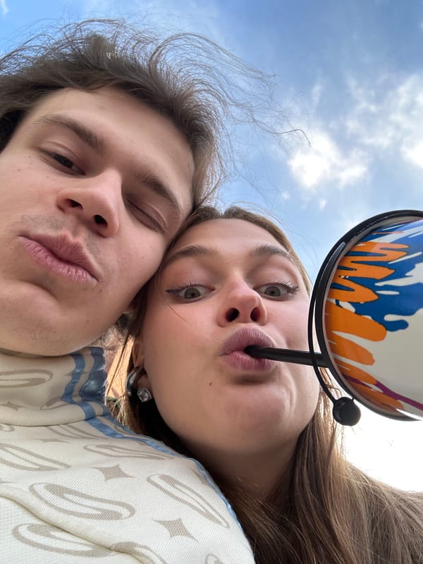 Woman photographed at multiple Krasnoyarsk landmarks during midday outing