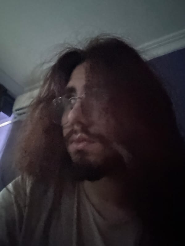 Quick burst of low-light indoor selfies, varying angles and focus