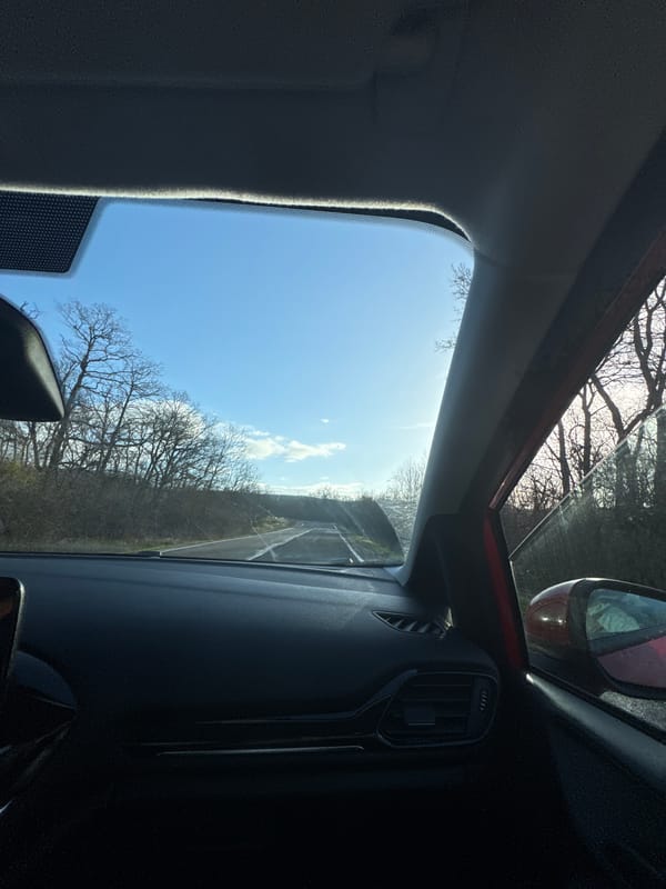 Morning sky view captured through vehicle window in Bulgaria
