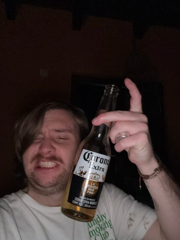 Person drinks Corona, takes selfies in Mexican home