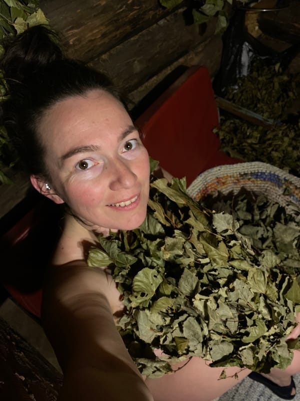 Woman enjoys traditional Russian sauna experience in Noviy