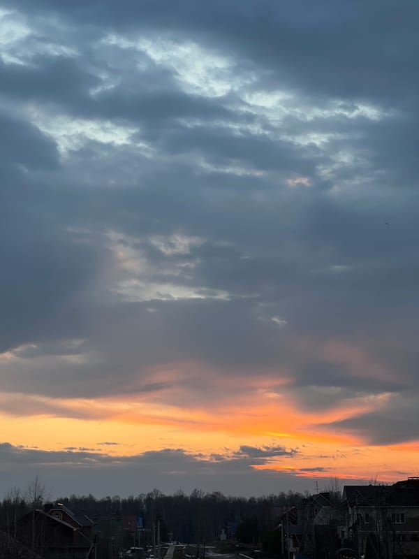 Sunset documented through village streets in Noviy, Russia