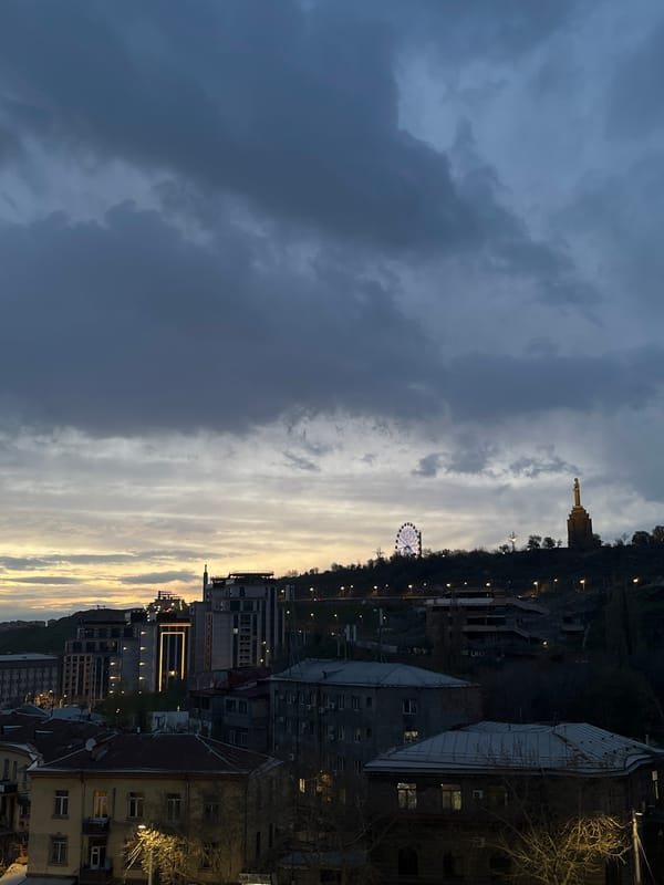 Evening street scenes captured in Yerevan during dramatic dusk