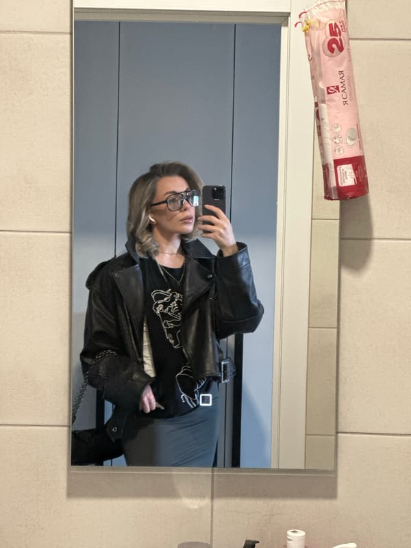Woman takes morning mirror selfies in Khimki bathroom