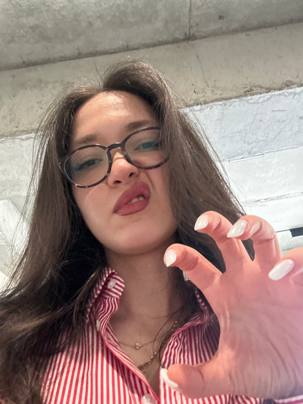 Woman Takes Indoor Selfies in Zovuni, Armenia