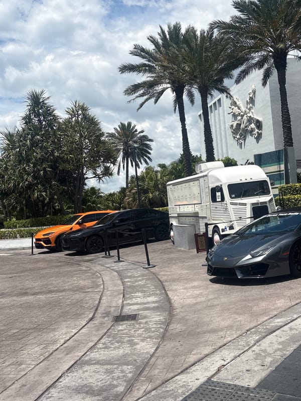 Luxury sports car spotted parked near food truck in Miami Beach