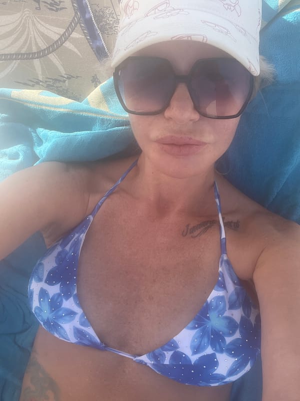 Lazy beach afternoon: sun, selfies, and cold beers
