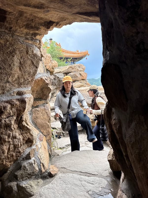 Early morning visitors explore Summer Palace stone features