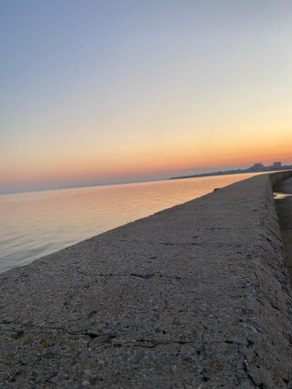 Spring sunset stroll documented along Pomorie's Black Sea waterfront