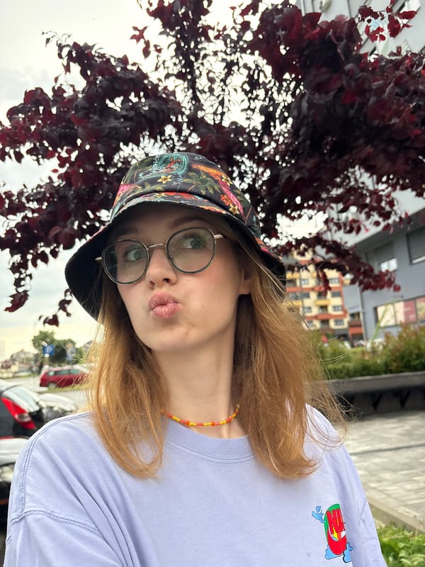 Woman captures selfies and rain-soaked roses in Kragujevac