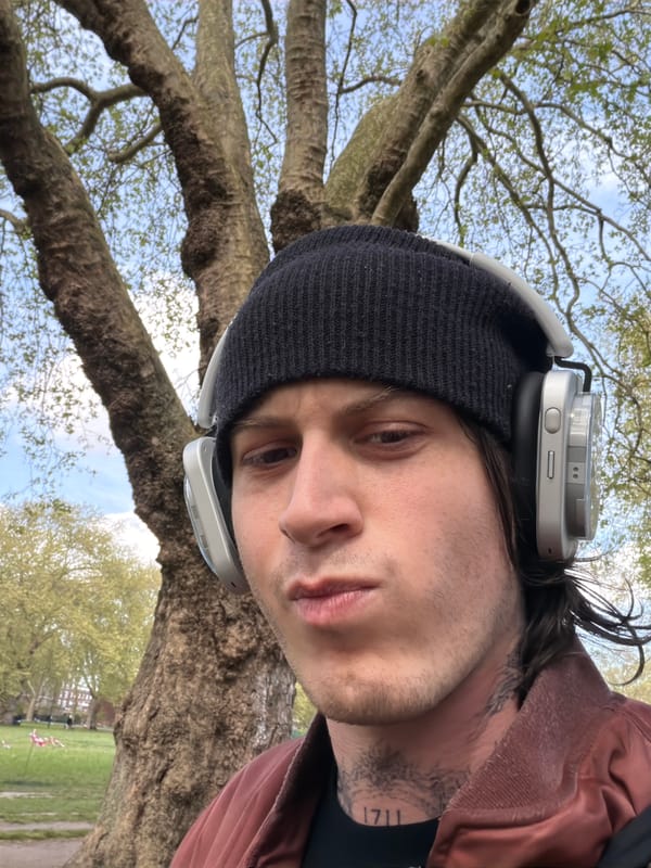 Young man photographed in various poses at London park