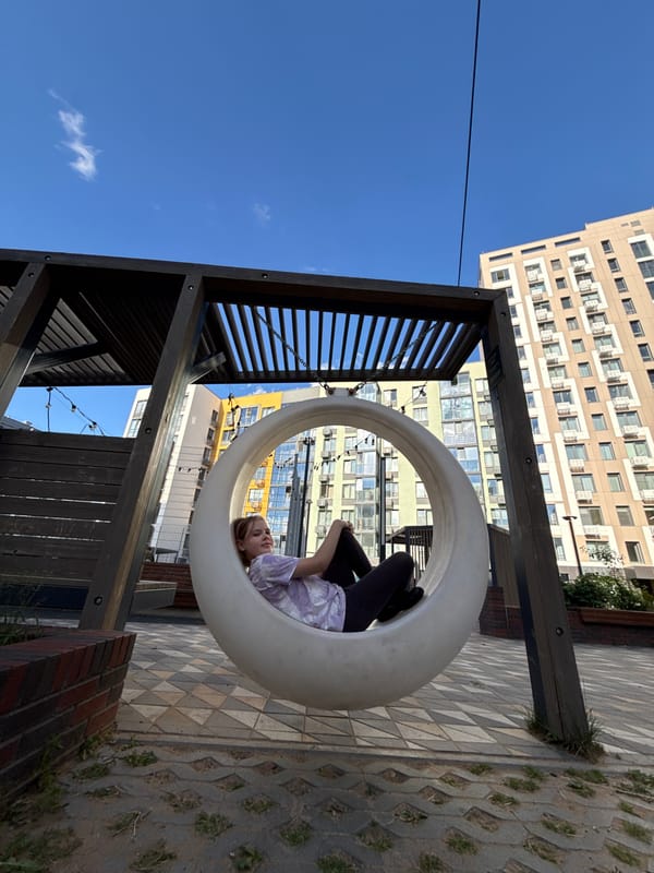 Children play in Izhevsk parks and courtyards on sunny afternoon