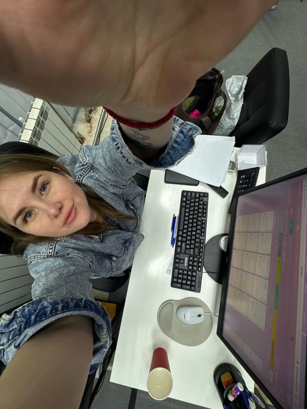 Woman works at computer desk using project software in Perm