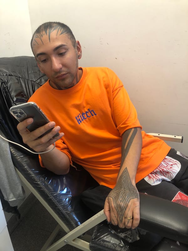 Young musician performs with electric guitar in Buenos Aires