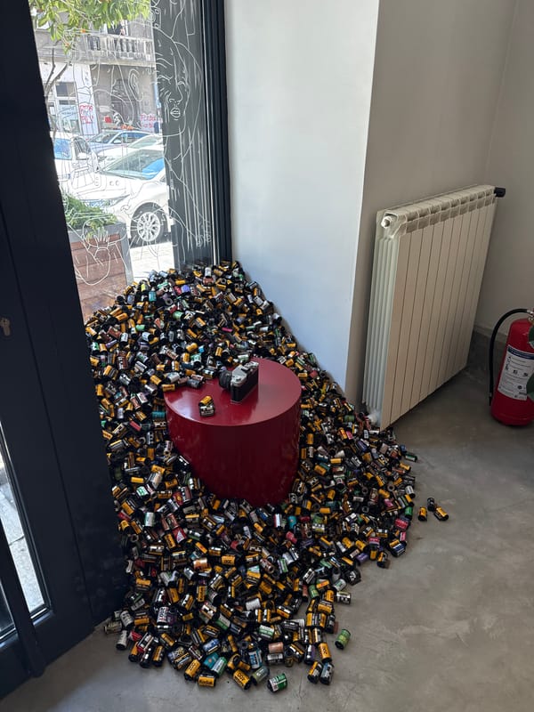 Film canister art installation documented in Belgrade street scenes