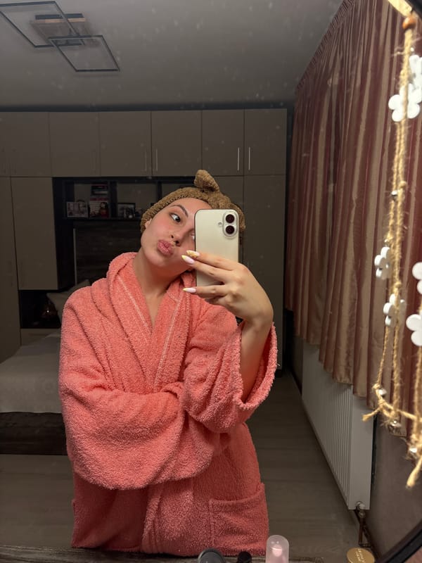Woman Takes Bathroom Mirror Selfies in Animal Headband