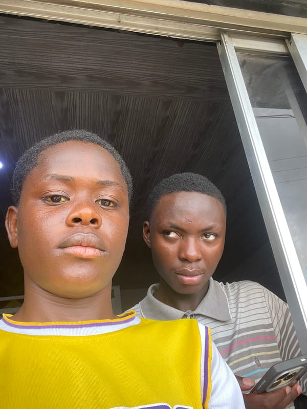 Everyday street life on a Jos, Nigeria block