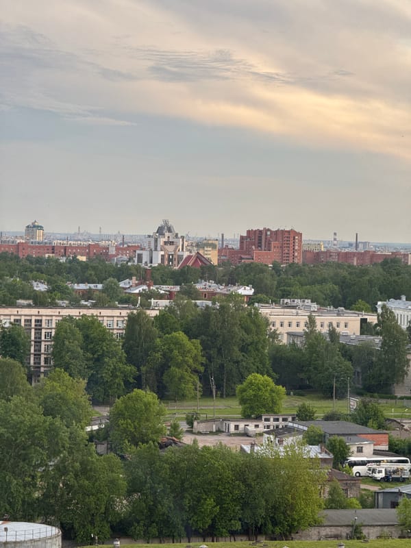 Elevated cityscape views captured during dramatic evening skies