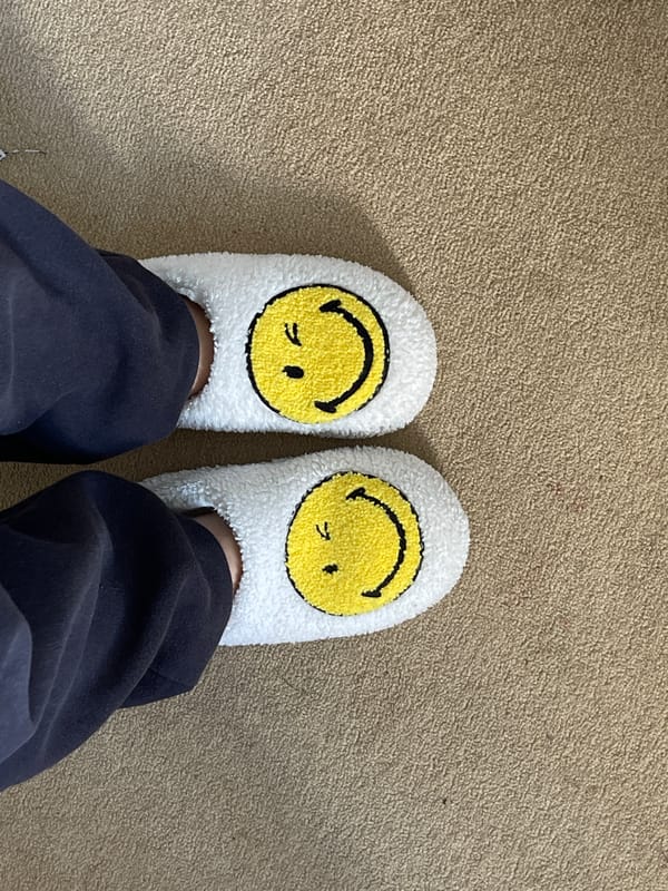 Person spotted wearing smiley face slippers in Maidstone home