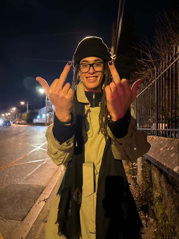 Nighttime photo session captured on Orsay sidewalk