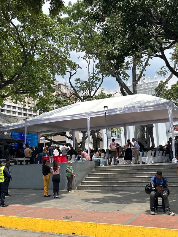Public event under tents draws crowd in Caracas square