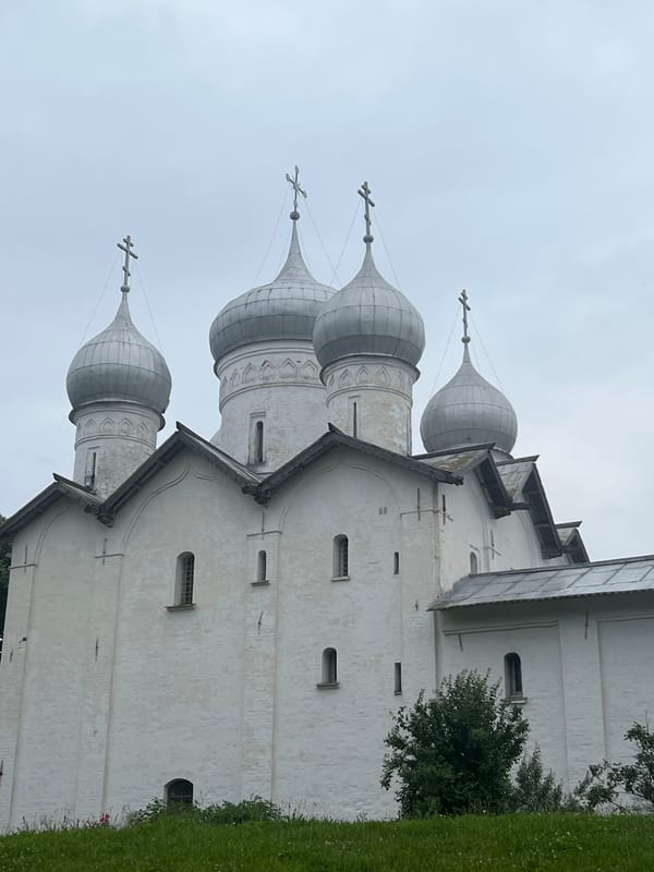 Monuments, medieval stonework, and summer flowers in Veliky Novgorod