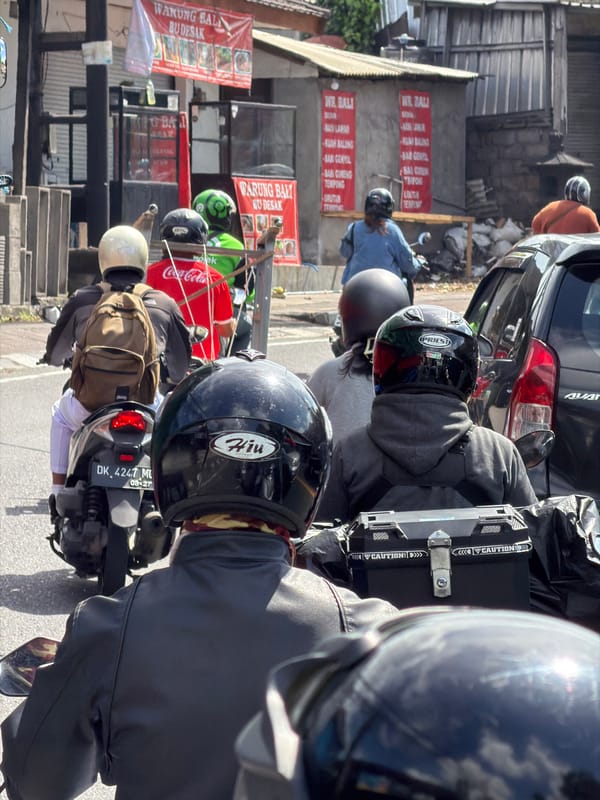 Traffic jam with motorcycles observed in Mengwi, Indonesia