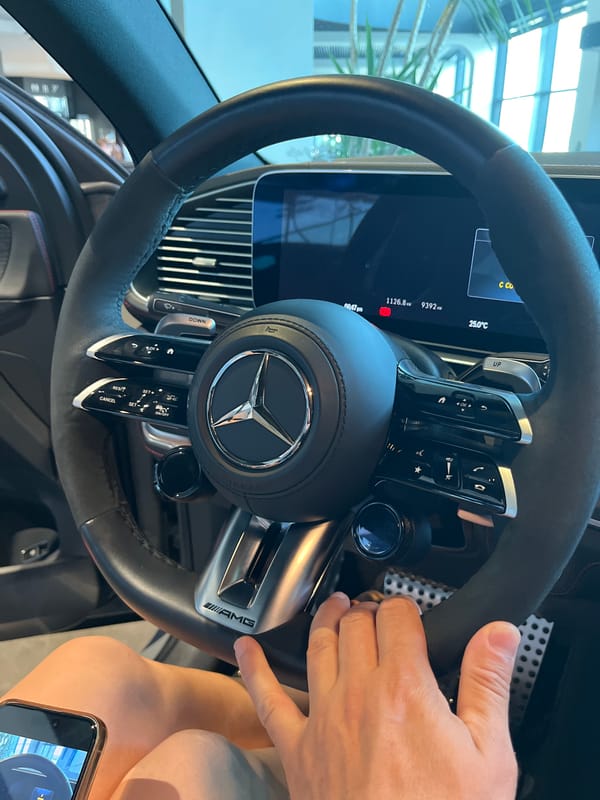 Family tours luxury car dealerships in Sochi, Russia