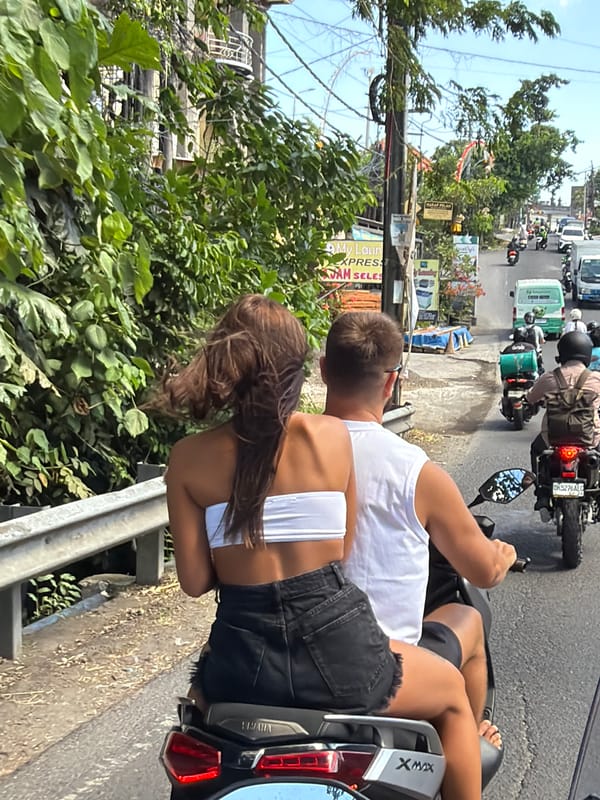 Morning traffic and market activity in Mengwi, Bali