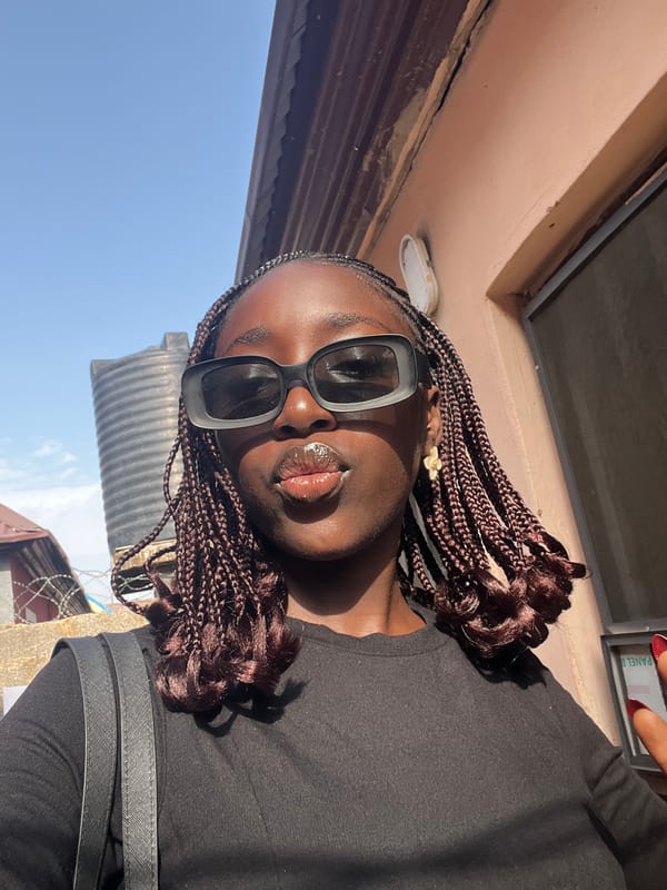 Woman in sunglasses observed near water tank in Abuja