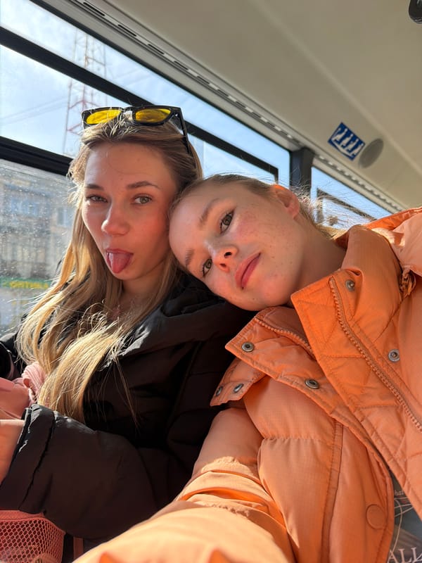 Two women take selfie on public transport in Berezniki