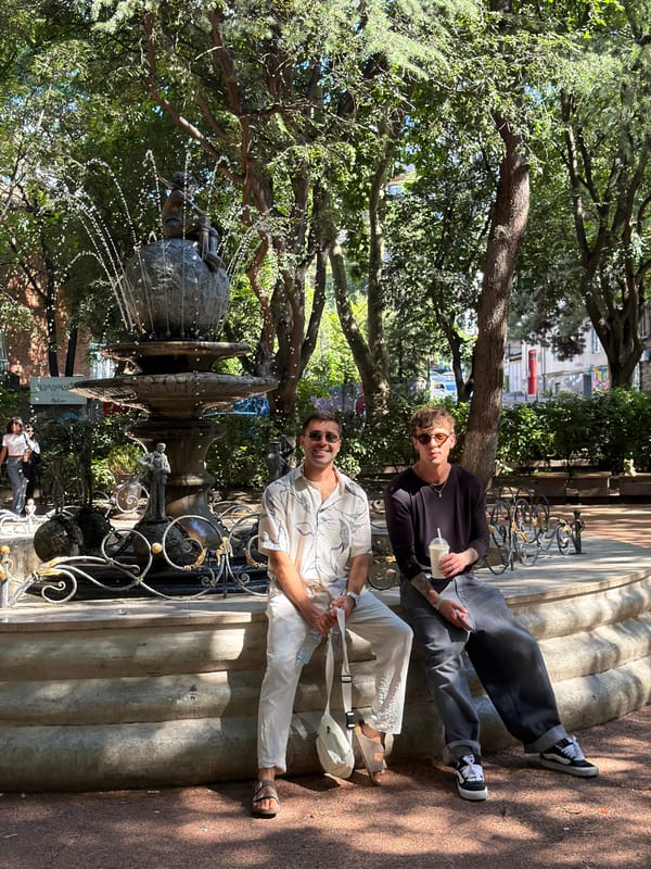 Afternoon in a Tbilisi park, around an ornate stone fountain