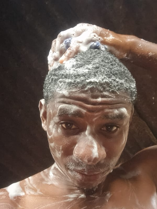 Man photographed washing with soap in Onitsha Nigeria