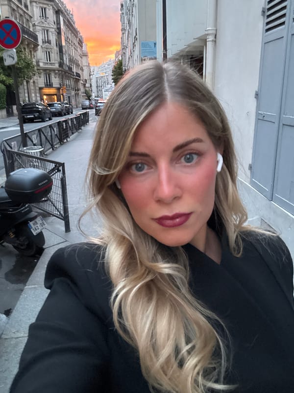 Woman documents sunset evening stroll through Paris streets