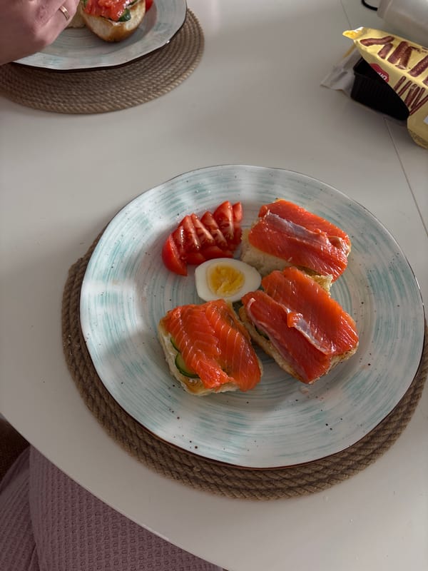 Salmon sandwiches photographed in triangular arrangement in Krasnoyarsk
