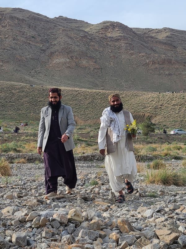 Men gather for mountain picnic in Quetta Pakistan